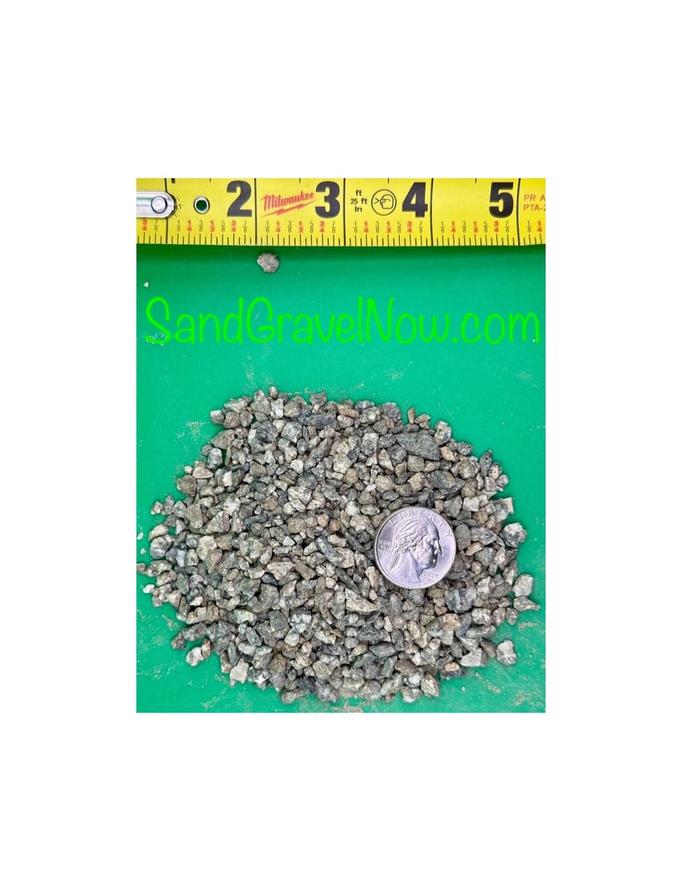 Fine 1/4 inch birdseye gravel chips on a green board with a quarter and a tape measure for scale.